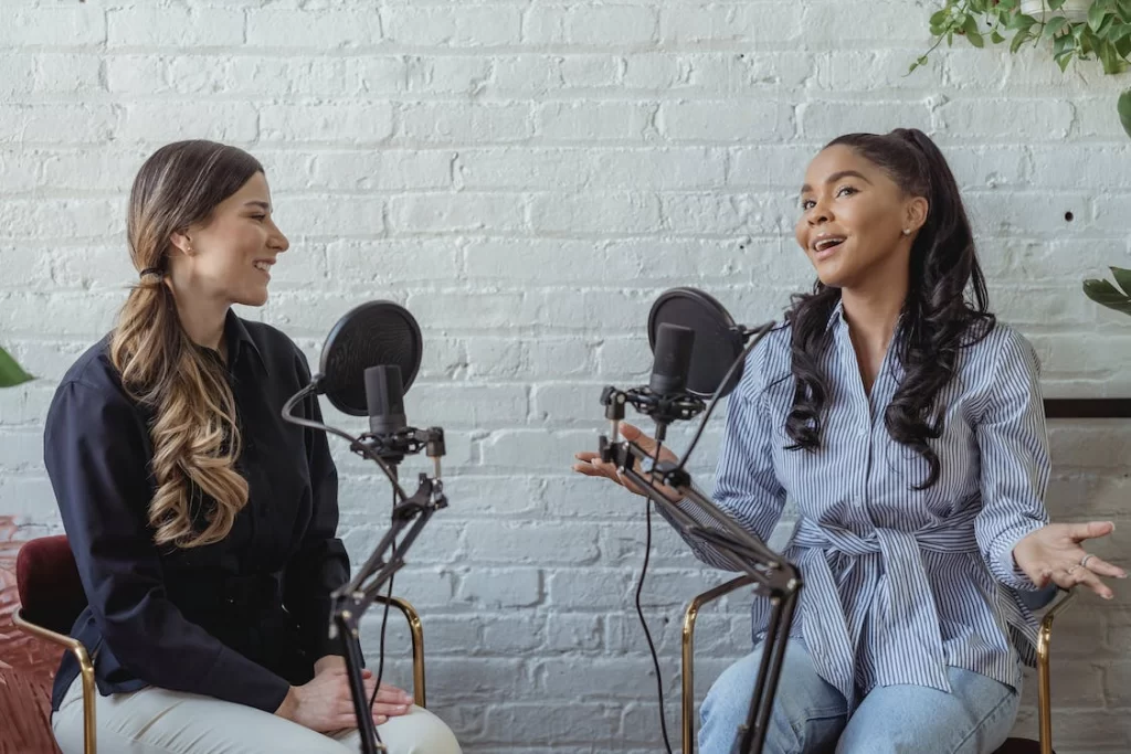 positive-black-woman-talking-to-radio-host