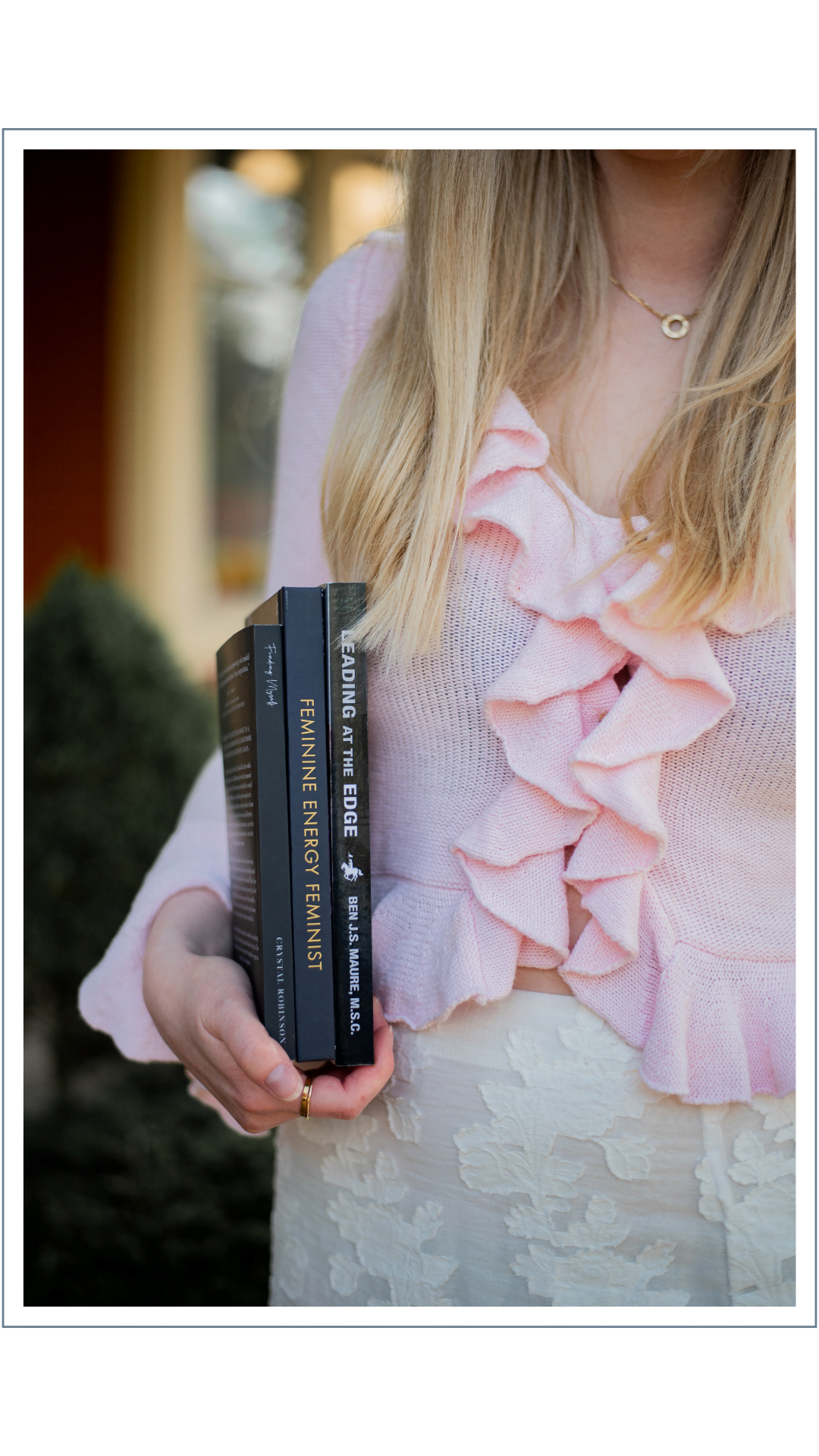 Talk+Tell, book publishing company, owner holding books, emphasizing our book publishing expertise